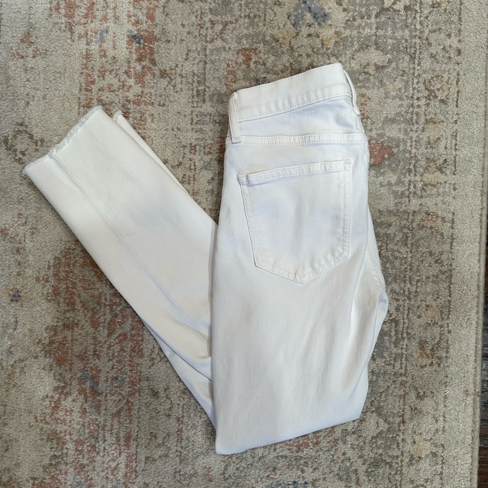 White Vintage Slim Mid Rise white jeans​​​​​​​